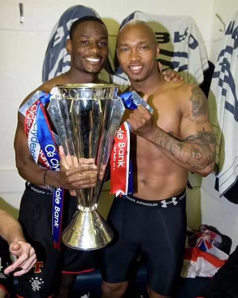 Rangers Football Club: Championship Celebration - Mo Edu and El Hadji Diouf in the Dressing Room (2010-11)