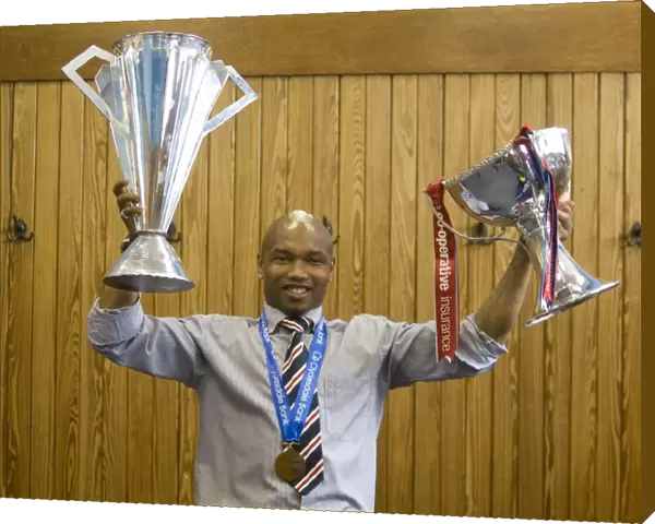 Rangers Football Club: El Hadj Diouf's Triumphant Ibrox Moment with SPL and League Cup Trophies (2010-11)