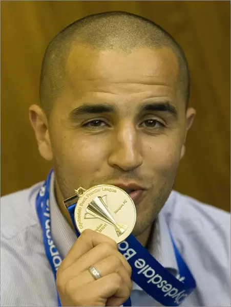 Rangers Football Club: Madjid Bougherra's Emotional Victory - SPL Champions Medal Kiss (2010-11)