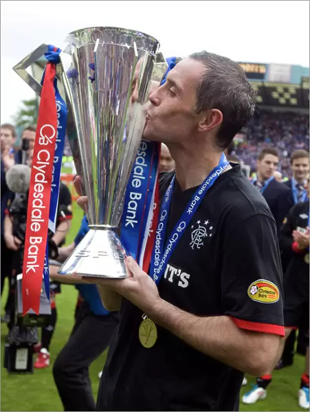 Rangers Football Club: David Weir's Triumphant Moment - Celebrating SPL Championship Glory at Rugby Park (2010-11)