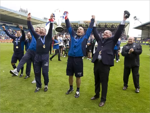 Rangers Football Club: Champions of SPL 2010-11 - Triumphant Moment with Players and Coaching Staff Celebrating Victory over Kilmarnock
