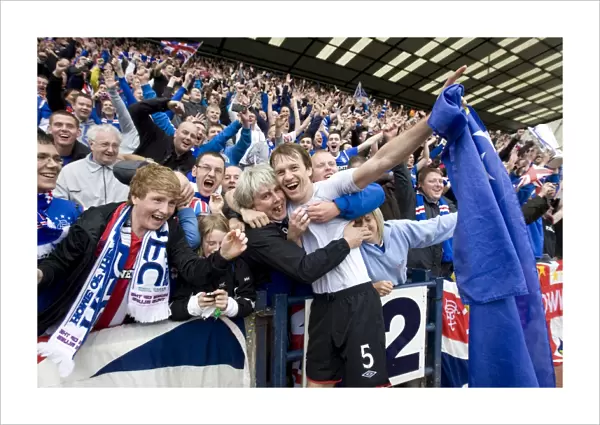 Rangers Football Club: Sasa Papac and Ecstatic Fans Celebrate 2010-11 Clydesdale Bank Scottish Premier League Championship Win at Rugby Park