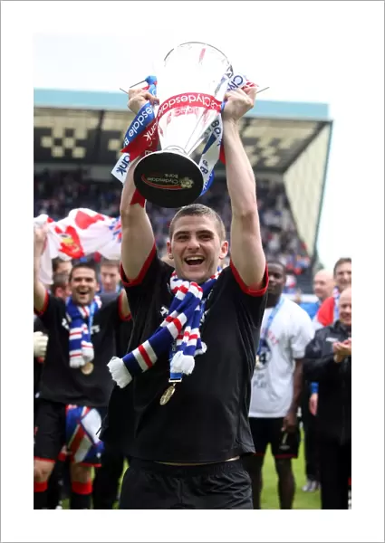 Rangers Football Club: Kyle Hutton's Triumphant Moment - Celebrating the 2010-11 SPL Championship Win Against Kilmarnock at Rugby Park