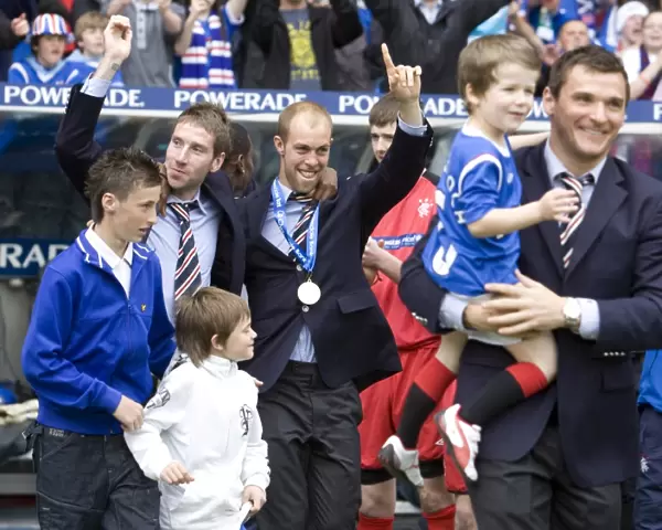 Rangers Football Club: Euphoric Celebration of SPL Championship Win by Kirk Broadfoot and Steven Whittaker at Ibrox Stadium (2010-11)