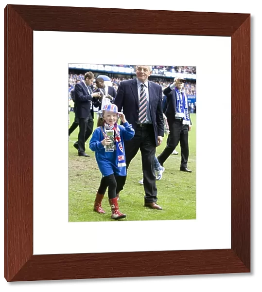 Champion Celebrations: Walter Smith and Granddaughter Jessica at Ibrox Stadium - Rangers SPL Victory (2010-11)