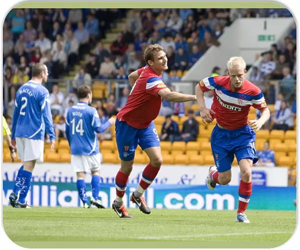 Rangers Steven Naismith Celebrates Glory: 2-0 Win Against St. Johnstone in Scottish Premier League