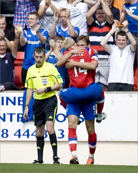 Rangers Jelavic and Naismith: Celebrating Goals in St Johnstone's Defeat (2-0 Clydesdale Bank Scottish Premier League)