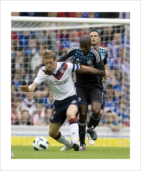 Intense Battle for the Ball: Rangers vs. Chelsea - A Pre-Season Friendly at Ibrox Stadium (3-1 in Favor of Chelsea)