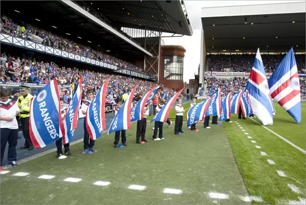 Rangers vs Chelsea: Pride and Defiance - Rangers Flag Bearers Amidst a 1-3 Loss at Ibrox Stadium