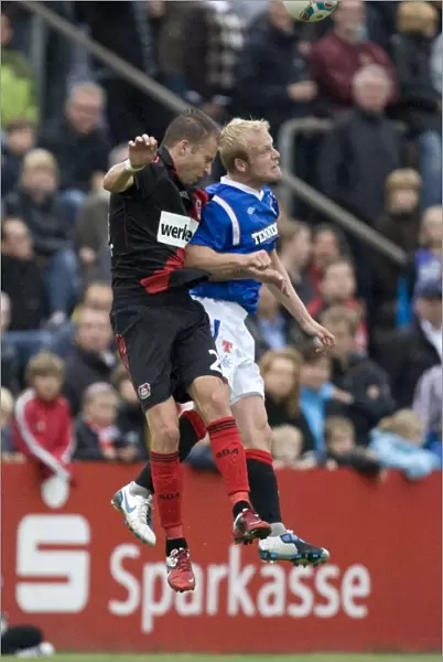 Michal Kadlec Shines: Rangers vs. Bayer Leverkusen (2-0) - Kadlec Outperforms Naismith at Takko Stadium