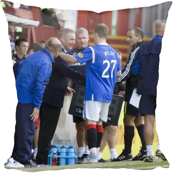 Ally McCoist Congratulates Gregg Wylde on His Third Goal: Motherwell 0-3 Rangers (Clydesdale Bank Scottish Premier League)