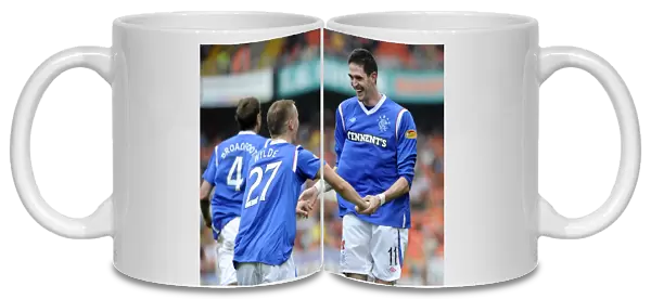 Rangers Kyle Lafferty and Gregg Wylde: Celebrating a 1-0 Victory Over Dundee United