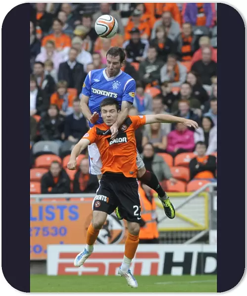 Rangers Kirk Broadfoot Outjumps Dundee United's Ryan Dow: The Decisive Header (1-0 Rangers, Clydesdale Bank Scottish Premier League)