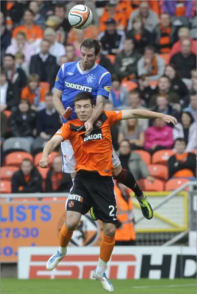Rangers Kirk Broadfoot Outjumps Dundee United's Ryan Dow: The Decisive Header (1-0 Rangers, Clydesdale Bank Scottish Premier League)