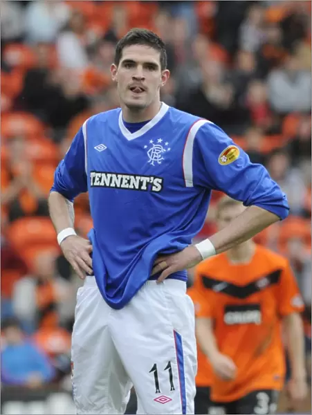 Kyle Lafferty's Game-Winning Goal: Rangers Conquer Dundee United in Scottish Premier League at Tannadice Stadium