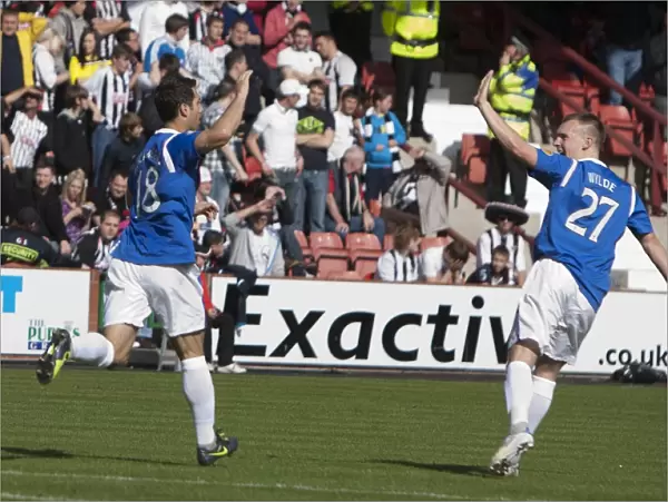 Rangers Bocanegra and Wylde: Unstoppable Duo Celebrates 4-0 Goal Against Dunfermline