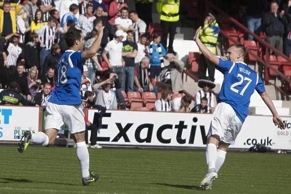 Rangers Bocanegra and Wylde: Unstoppable Duo Celebrates 4-0 Goal Against Dunfermline