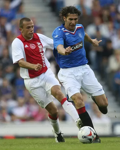 Rangers vs. AFC Ajax: A Pre-Season Friendly Battle at Ibrox - A Goal-Filled Encounter between Carlos Cuerellar and John Heitinga (1-1)