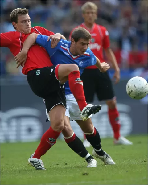 Rangers FC: Kevin Thomson's Determination at Hannover's AWD Stadium - Pre-Season Victory (1-0)