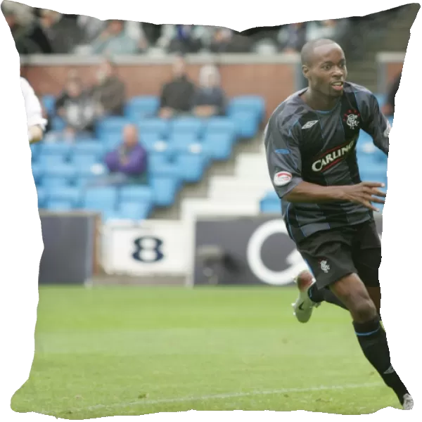 Rangers DaMarcus Beasley: Celebrating His Opening Goal Against Kilmarnock (2-1) in the Clydesdale Bank Premier League