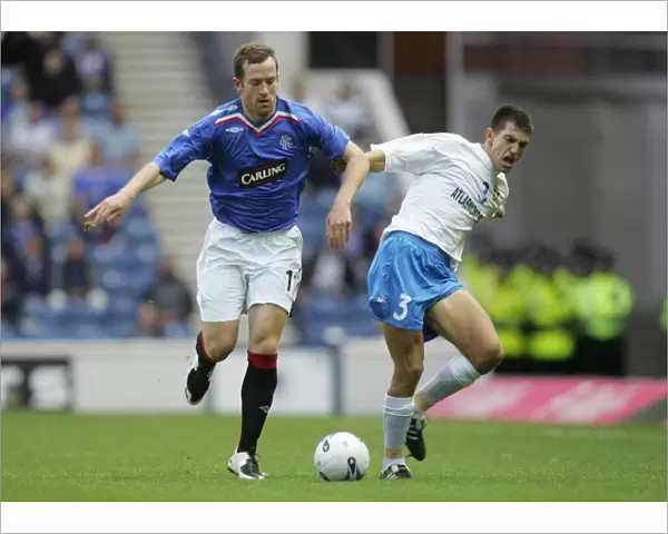 Rangers vs FK Zeta: Champions League Qualifier - Clash between Charlie Adam and Milan Vuckovic (2-0 at Ibrox)
