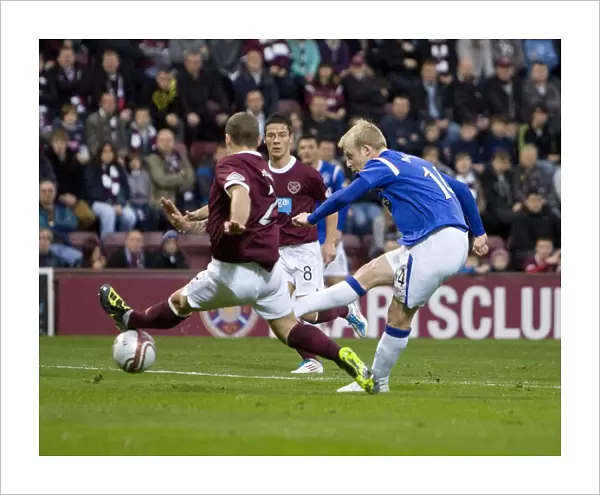 Rangers Steven Naismith Scores Opening Goal Against Hearts in Scottish Premier League at Tynecastle Stadium (14-2-1: Rangers 2-0 Hearts)