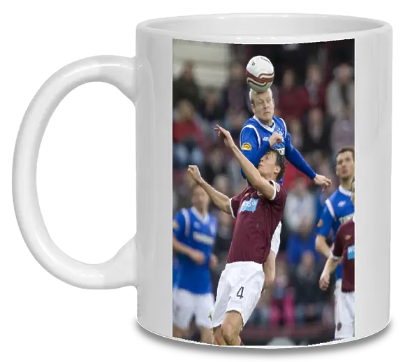 Rangers Naismith Outjumps Hearts Jonsson: 0-2 Lead Secured with a Powerful Header at Tynecastle Stadium