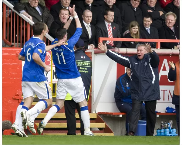 Rangers Kyle Lafferty and Ally McCoist: Celebrating a Winning Goal in the Scottish Premier League (Aberdeen 1-2 Rangers)