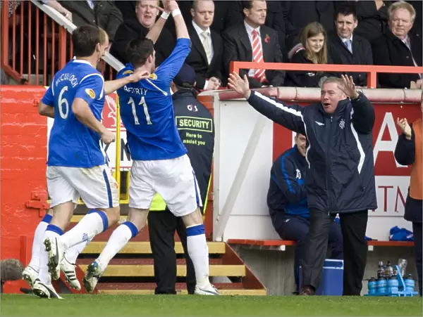 Rangers Kyle Lafferty and Ally McCoist: Celebrating a Winning Goal in the Scottish Premier League (Aberdeen 1-2 Rangers)