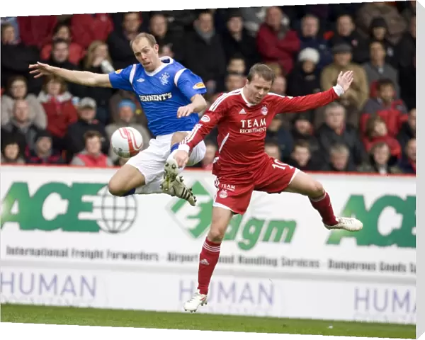 Rangers vs Aberdeen: Whittaker and Mackie in Action - Clydesdale Bank Scottish Premier League - Pittodrie Stadium: Rangers 2-1 Victory
