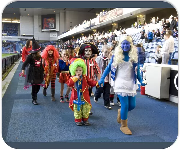 Halloween Fun at Ibrox: Rangers Kids Exhilarating Costume Lap of Honor after Triumphant 3-1 Victory over Dundee United (Clydesdale Bank Scottish Premier League)