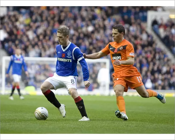 Steven Davis Scores the Thrilling Third Goal: Rangers 3-1 Dundee United at Ibrox Stadium (Scottish Premier League)