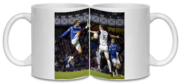 Jelavic vs. Golobart: A Clash of Titans in the Rangers vs. Inverness Clydesdale Bank Scottish Premier League Match at Ibrox Stadium (Rangers 2-1 Inverness CT)