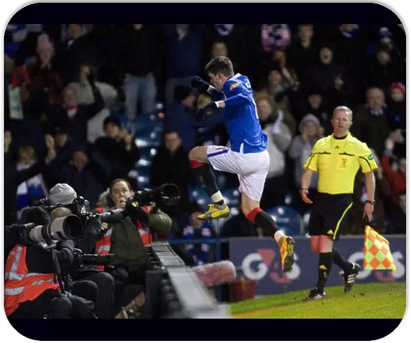 Rangers Kyle Lafferty's Epic Leap: Unforgettable Fans Celebration of a Hard-Fought 2-1 Victory over Inverness Caley Thistle at Ibrox Stadium