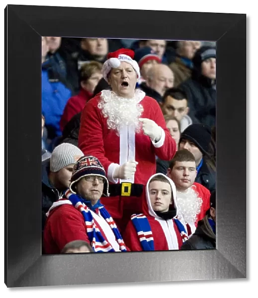 Santa's Army: Rangers Fans Celebrate 2-1 Victory over Inverness Caley Thistle in Santa Claus Costumes at Ibrox Stadium
