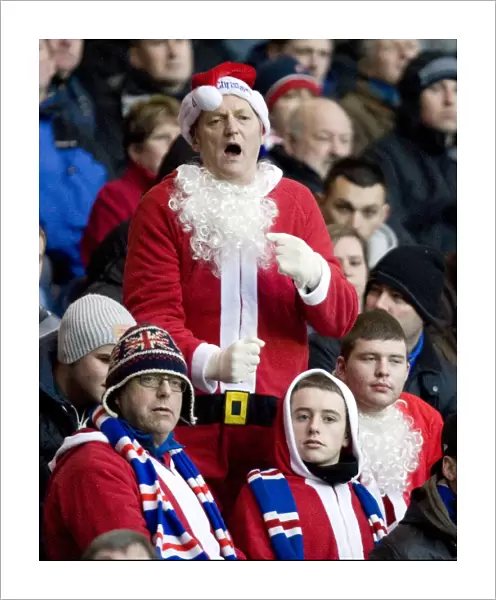 Santa's Army: Rangers Fans Celebrate 2-1 Victory over Inverness Caley Thistle in Santa Claus Costumes at Ibrox Stadium
