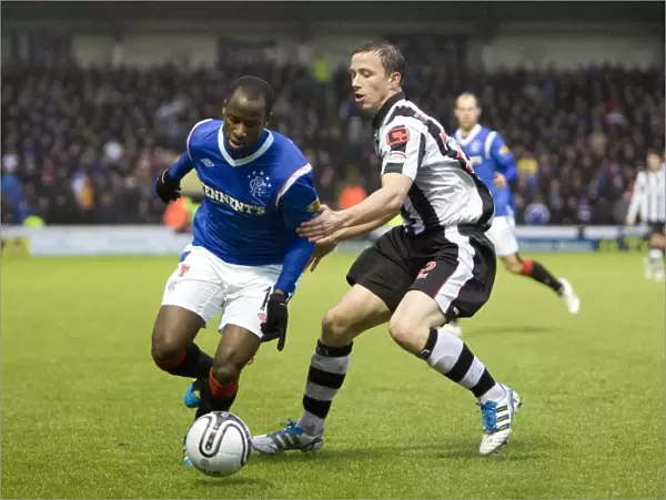 Intense Rivalry: Aluko vs. van Zanten Clash in St Mirren vs. Rangers Clydesdale Bank Scottish Premier League Match