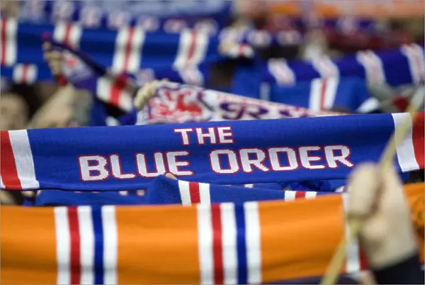 Triumphant Rangers Blue Order: A Sea of Scarves in Celebration at Ibrox Stadium (3-0 Victory over Motherwell)