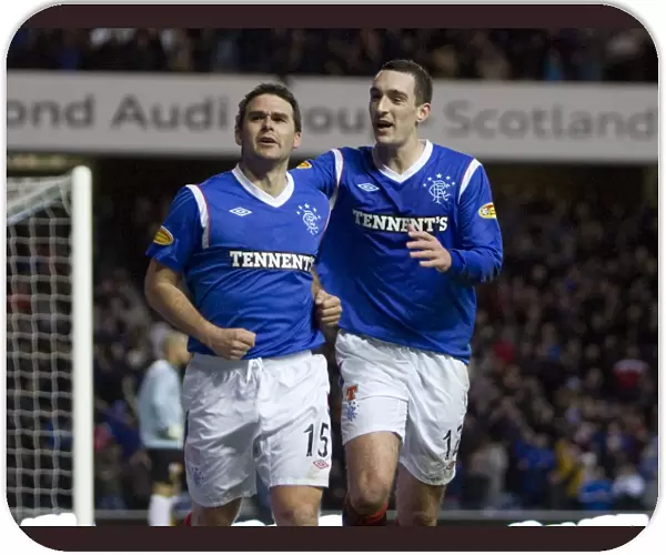 Rangers David Healy and Lee Wallace: Celebrating a 3-0 Victory Over Motherwell at Ibrox Stadium