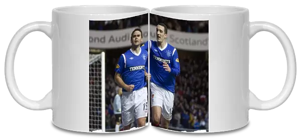 Rangers David Healy and Lee Wallace: Celebrating a 3-0 Victory Over Motherwell at Ibrox Stadium