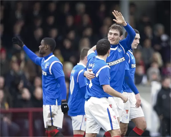 Rangers Nikica Jelavic Leads the Team to a 4-0 Victory over Arbroath: Celebrating Goal Scoring Glory