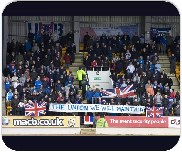 Rangers Celebrate 1-2 Victory Over St. Johnstone at McDiarmid Park: Fans Triumphant Banner
