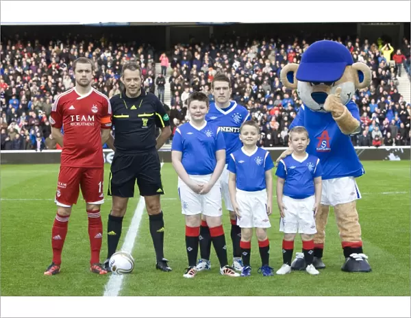 Rangers vs Aberdeen: A Thrilling 1-1 Draw in the Scottish Premier League at Ibrox Stadium - Mascots in Action