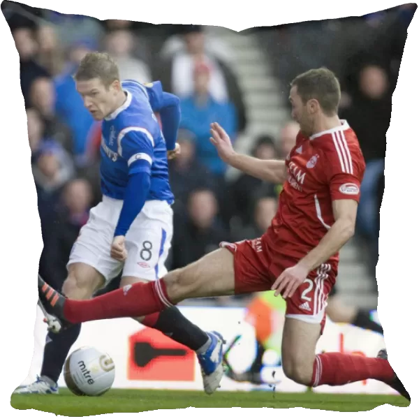 Clash of Captains: Steven Davis vs Rory McArdle - A Draw at Ibrox Stadium, Scottish Premier League (1-1)