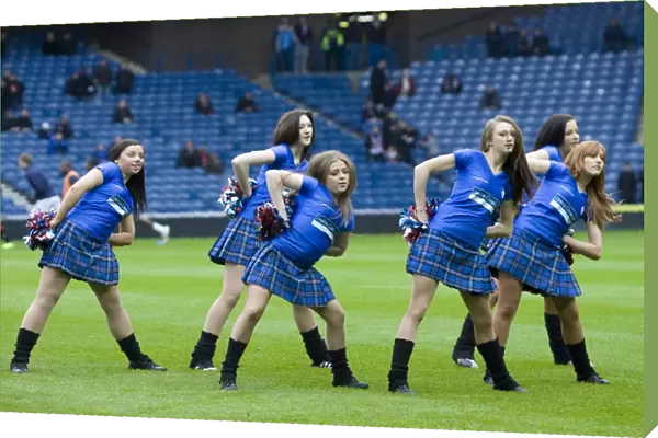 Bittersweet Triumph: Rangers Cheerleaders Overcome 0-2 Defeat to Dundee United