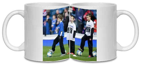 Rangers vs Kilmarnock: Half Time at Ibrox - Soccer Schools in Action Amidst a 1-0 Deficit