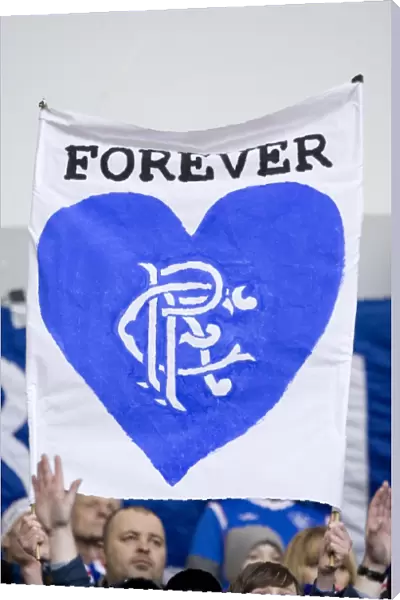 Disappointed Rangers Fans Rally with We'll Be Back Banner Amidst 0-1 Defeat at Ibrox Stadium