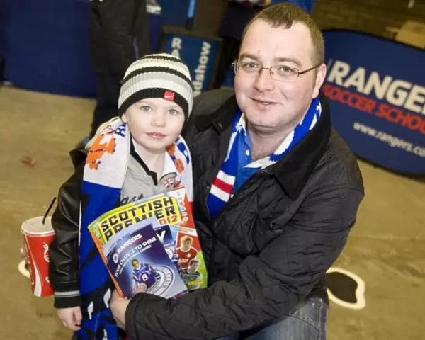 Family Fun and Football Thrills: Heart of Midlothian's Exciting 1-2 Victory at Rangers Broomloan Stand