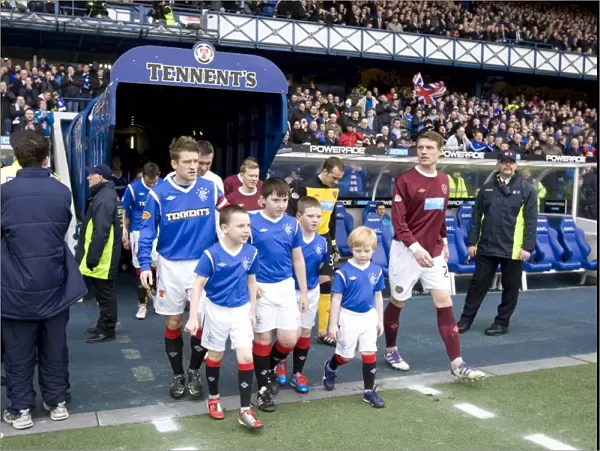 Bittersweet Ibrox Moment: Rangers Captain Steven Davis and the Mascots Amidst a 2-1 Loss to Hearts