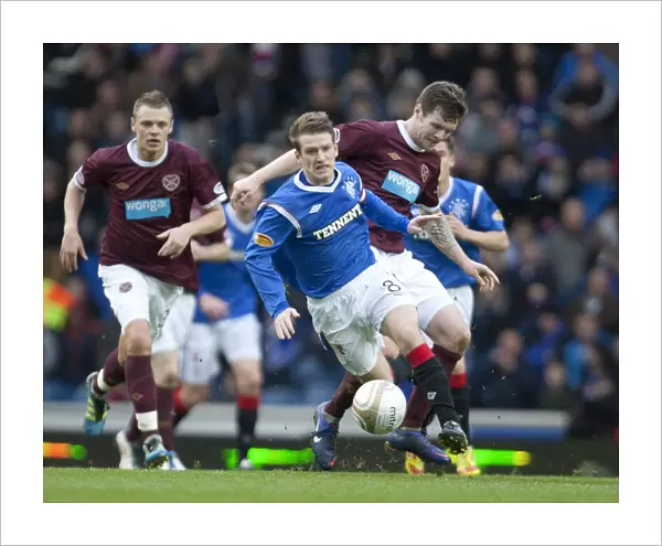 Rangers vs. Heart of Midlothian: Stevens Davis Foul by Darren Barr - Clydesdale Bank Scottish Premier League Match at Ibrox Stadium (1-2 in Favor of Hearts)